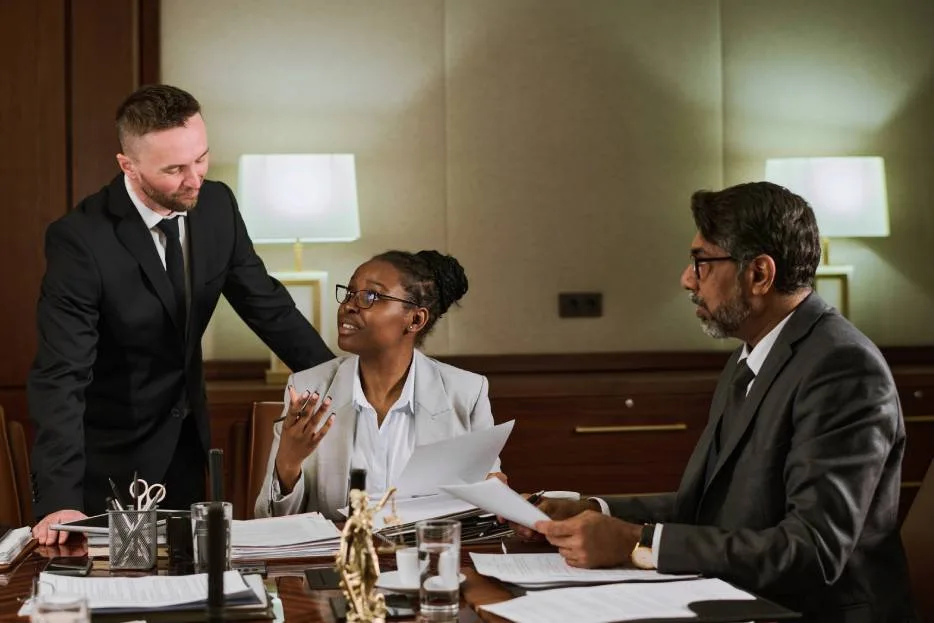 lawyers reviewing a case during a meeting