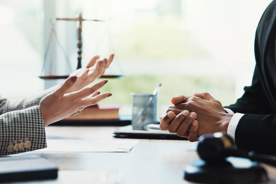 attorney providing guidance on financial matters to an entrepreneur